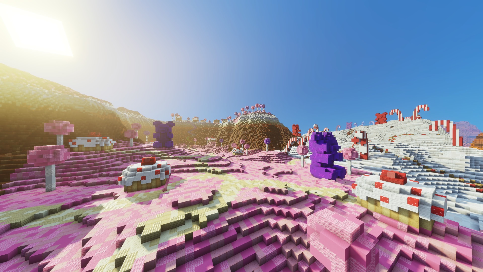 Pink candy hills, giant cupcakes and candy canes in Sugarloom